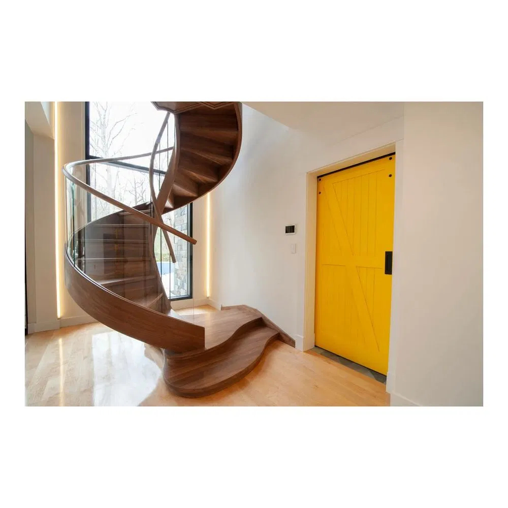 Curved Granite Stair Steps with Wrought Iron Railing