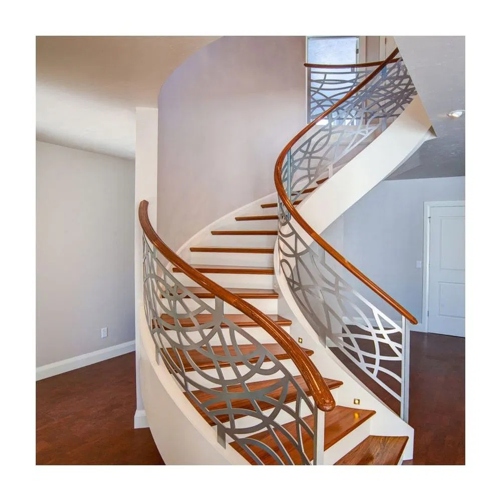 Curved Granite Stair Steps with Wrought Iron Railing